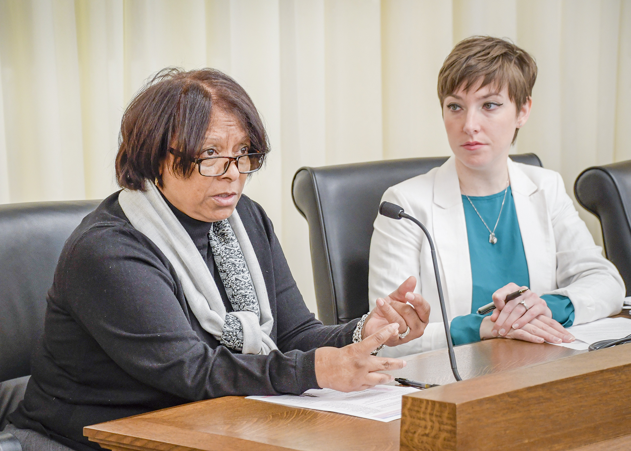 Nedra Robinson, early childhood program manager for Simpson Housing Services, testifies before the House Early Childhood Finance and Policy Division Feb. 18 in support of a bill sponsored by Rep. Carlie Kotyza-Witthuhn, right, that would provide additional funding for early childhood programs. Photo by Andrew VonBank